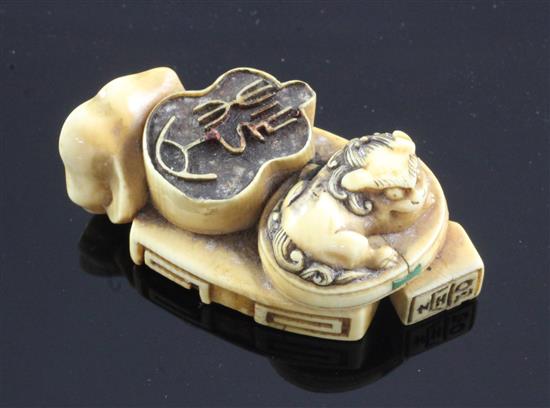 A Japanese ivory multi seal netsuke, 19th century, 5cm